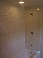 New bath tub & tile surround - awaiting grout, shower fixtures, and finishing touches New bath tub & tile surround - awaiting grout, shower fixtures, and finishing touches